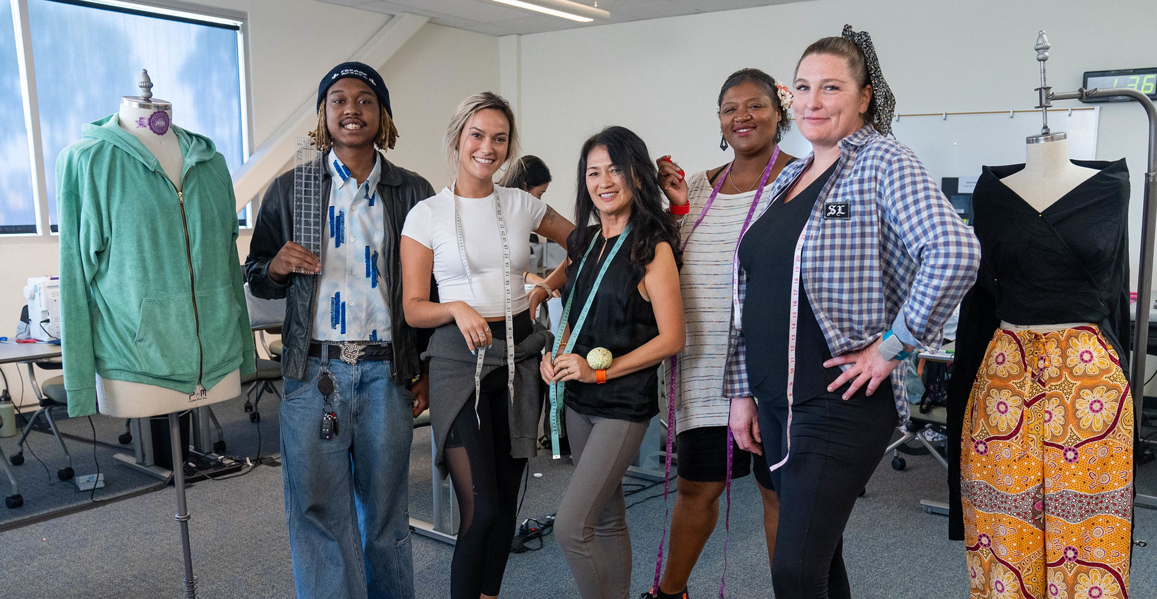 Clothing and textile students posing for picture in studio