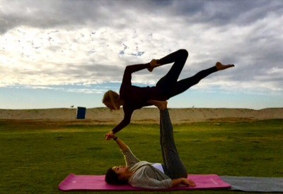 Madeline Practices Yoga