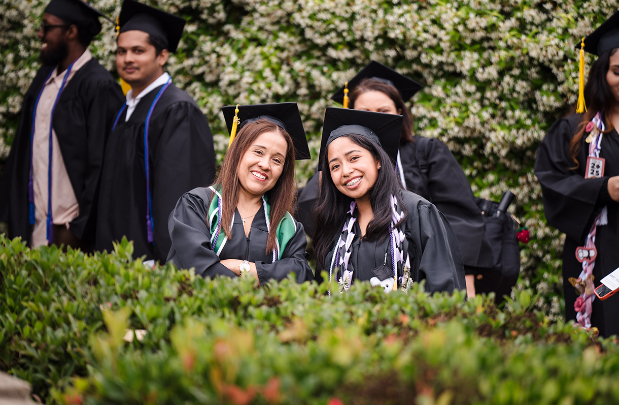 Two SDCCE female graduates outside