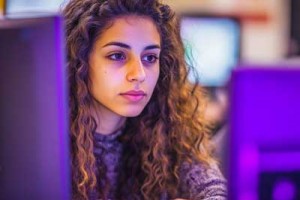 student in front of computer