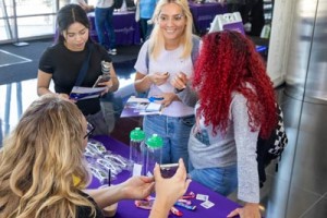 Students at outreach table