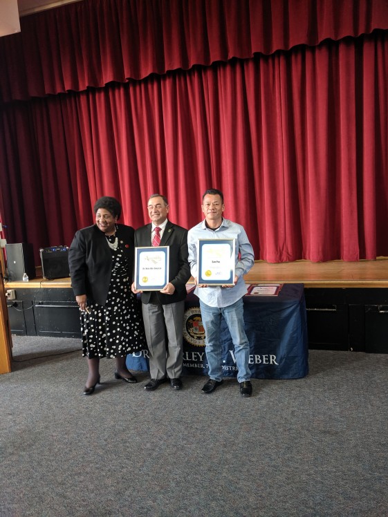 Dr. Shirley Weber, Unidentified man, and Sam Phu with award