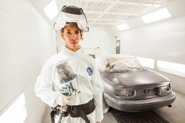 Student Elizette Garcia finishes project inside SDCE’s Auto Body and Paint Garage