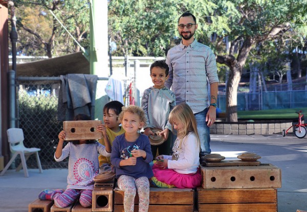(Photo Courtesy of Rhett S. Miller/U C Regents) SDCE Graduate Simone Scano leads outdoor activities with UC San Diego Early Childhood Education Center