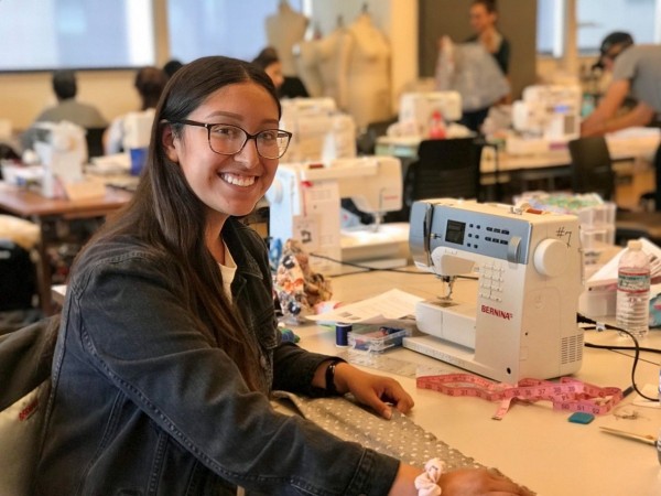 Ashley Sevilla sews pillowcases for foster youth at San Diego Continuing Education