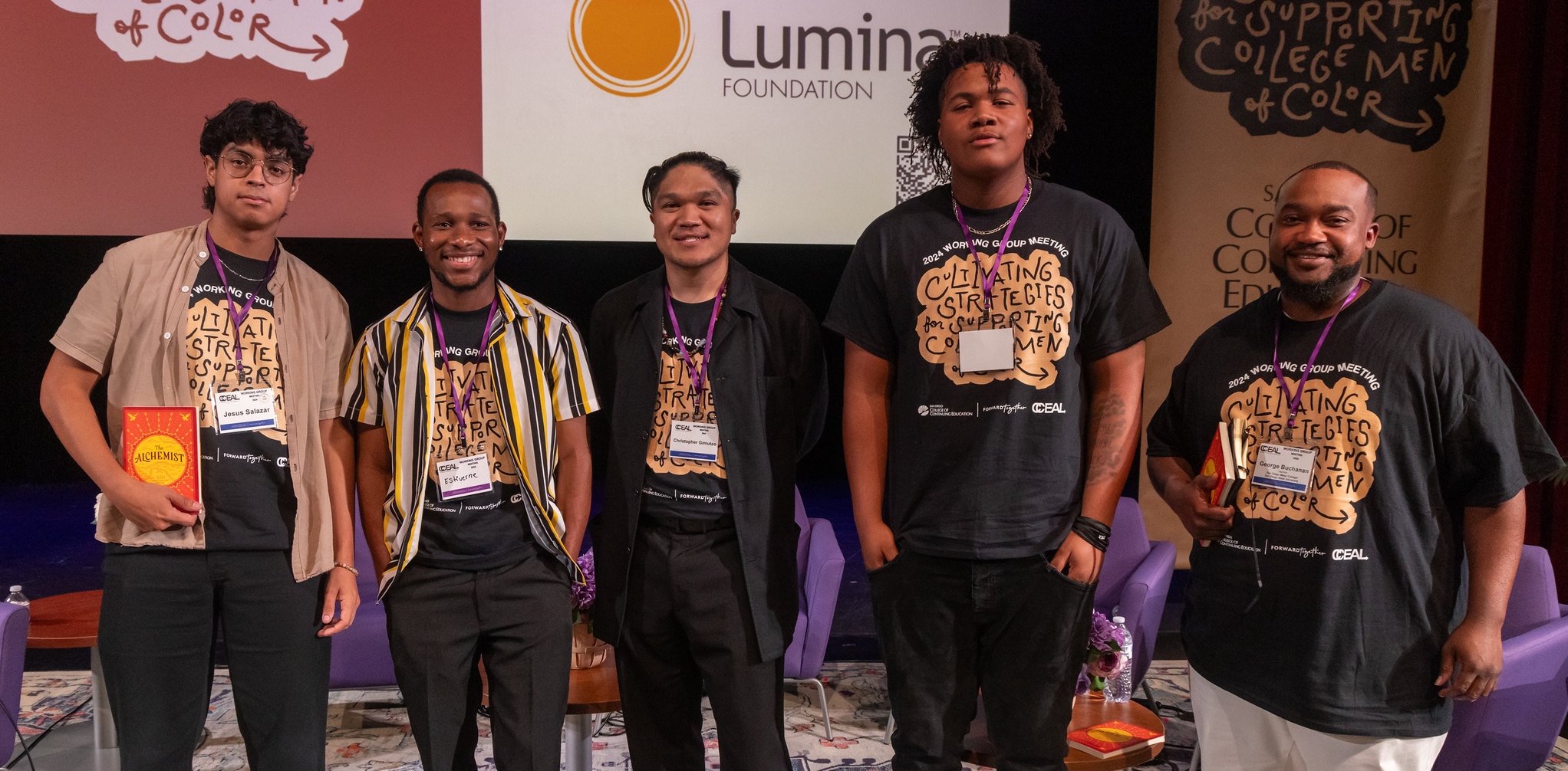 Five male students standing in a group for photo