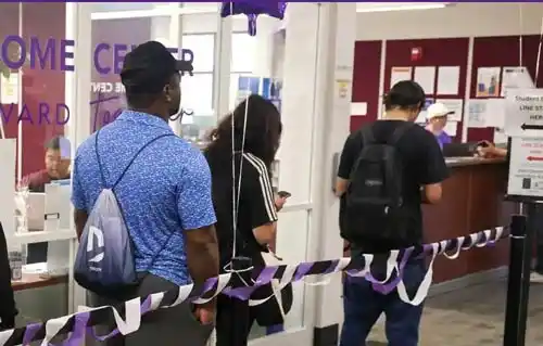 students waiting in line