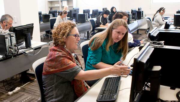 Students working at a computer station